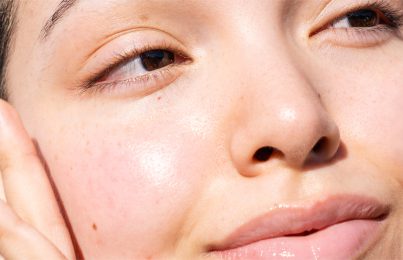 a closeup image of a womans face