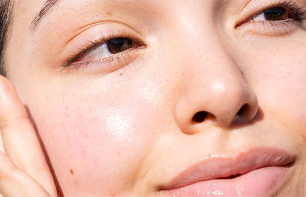 a closeup image of a womans face