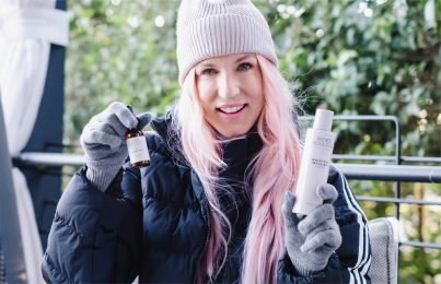 Renee holding Renee Rouleau's skincare products