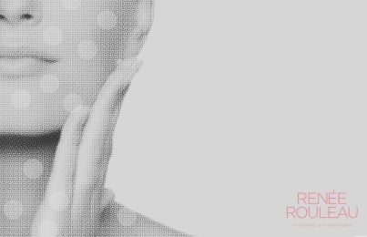 a woman's hands on her face