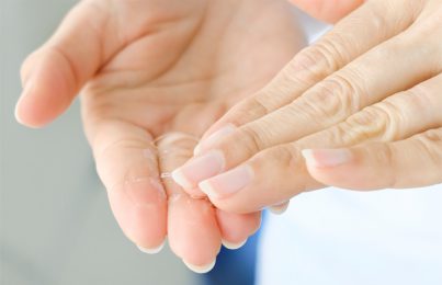 facial cleanser on a woman's hand