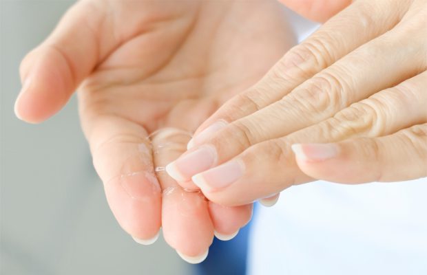 facial cleanser on a woman's hand