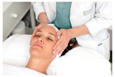 Renee's hands on a clients face