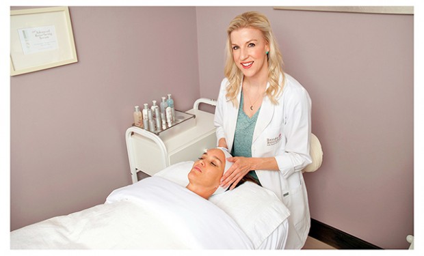 Renee's hands on a clients face
