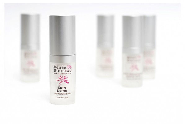 Renee Rouleau's skin drink with other products in the background
