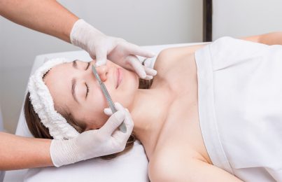 a woman getting dermaplaning