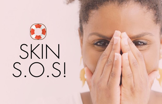woman covering her face with her hands