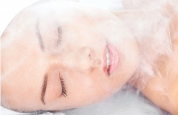 a woman in a steam room