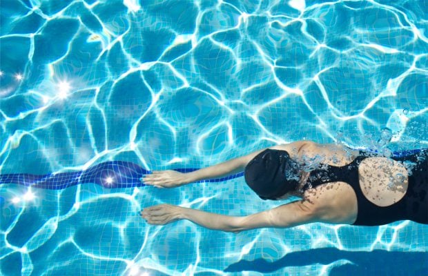 a woman in a swimming pool