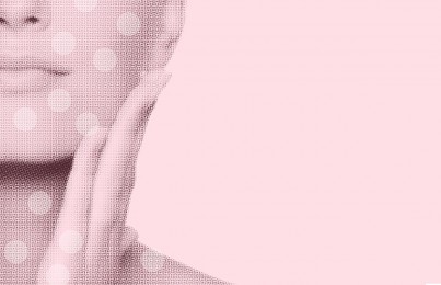 a woman with her hand on her cheek