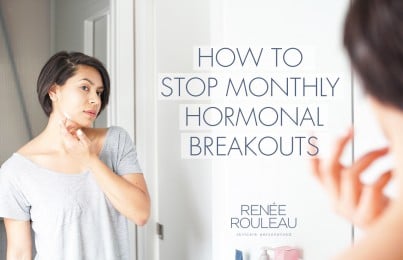 a woman checking her hormonal breakouts