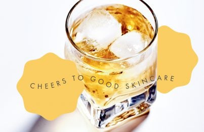 A glass of alcohol with ice