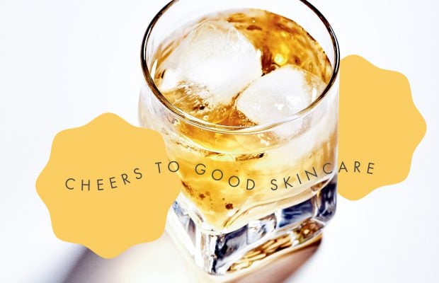 A glass of alcohol with ice