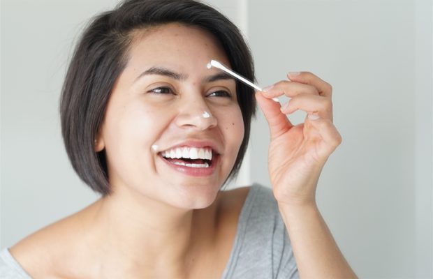 a woman doing spot treament