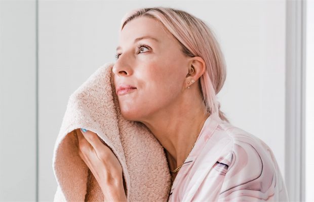 Renee Rouleau drying her face
