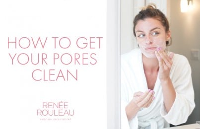 a woman applying a scrub to her face