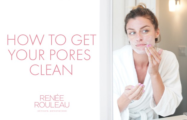 a woman applying a scrub to her face