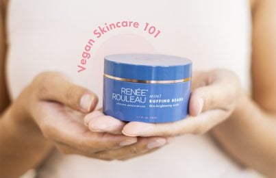 a woman holding Renee Rouleau's mint buffing beads skin scrub