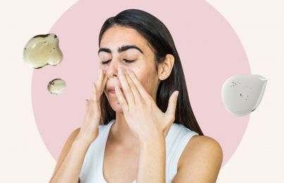 Woman applying skincare products on her skin
