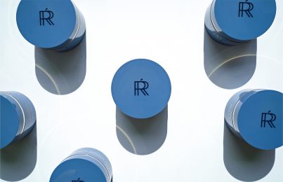 Blue jars of skincare product with Renée Rouleau logo