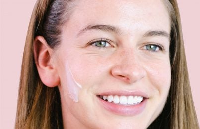 a woman doing the skincare product patch test to see if it is the right choice for her skin