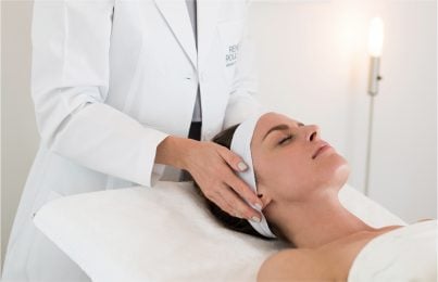 a woman being prepped for chemical peel by Renee Rouleau experts