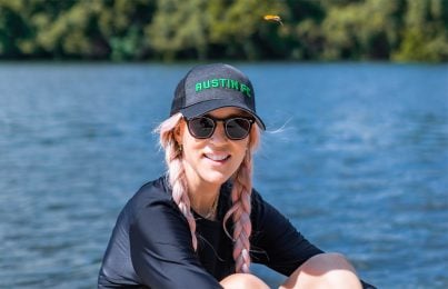 Renee Rouleau in the summer heat out on a lake