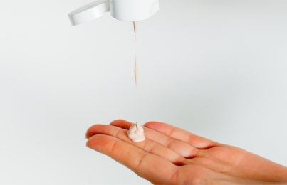 Renee Rouleau Tinted spf cream pouring onto a hand