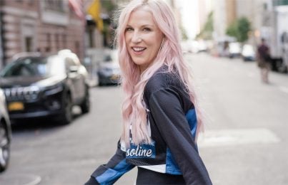 Renée Rouleau crossing the street and looking back